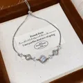 Close-up of elegant silver zircon adjustable slider bracelet with cat eye stone. - Cat's Eye Flower Style (HB5092) / Silver