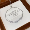 Close-up of elegant silver bracelet with rectangular cubic zirconia in jewelry box - Geometric Square Style (HB5088) / Silver