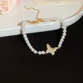 Elegant French retro pearl bracelet featuring a crystal-encrusted butterfly charm. - Pave Butterfly Pendant Bracelet (53#) / Gold