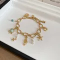 Bracciale a catena dorata vintage con ciondoli marini e perle - Stile Pendente Lusso del Palazzo dell'Oceano (26#) / Oro-Azzurro