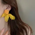 Close-up of yellow floral mesh drop earrings with beaded center on female model - Clustered Petals (2#) / Silver Earring Post Style / Yellow