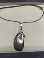 Vintage ethnic style sweater chain with dark wood and metallic gold oval pendant - Hollow Teardrop Necklace