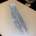 Detailed view of sparkling silver tassel earrings featuring elegant oval zircon studs for women - Silver Earring Post Style / Silver