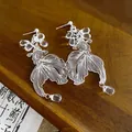 Elegant vintage Chinese style silver koi fish earrings with translucent teardrop beads - Koi Fish Style (HE20813) / Silver