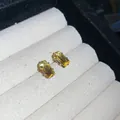 Pair of elegant square yellow zircon stud earrings with silver needle on white fabric - Small / Yellow