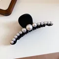 Detailed view of an elegant French style black hair claw clip with white pearls - #3 Gripper - Black - Round