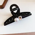 Detail of an elegant black hair claw clip featuring a large pearl and rectangular crystal. - 4# Grip Clip - Black - White Pearl