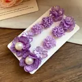 Elegant 5-pair set of purple floral earrings featuring pearls and resin flower designs. - 5 Pairs Set / Purple