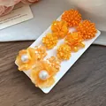 Elegant set of 5 pairs of orange pearl flower stud earrings with fabric petals and beads - 5 Pairs Set / Orange