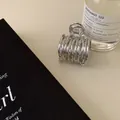 Pince à cheveux métallique argentée au design torsadé irrégulier et fini brillant - Croisé Plissé Argenté (1#)