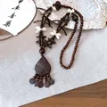Bohemian style dark wooden beaded necklace featuring white shell flowers and a drop pendant - 30# Necklace - Brown - Teardrop