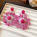 Detailed view of handmade pink woven flower earrings with a delicate rose center. - Steel Earring Post Style (12#) / Pink