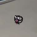 Detailed view of the cute cartoon black rabbit ring featuring a unique purple cat-eye stone. - Funny Rabbit Style / Pink (Eyes)