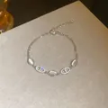 Squisito bracciale placcato in argento con pietre di opale ed elementi in zirconi - Bracciale Occhio di Gatto Naso di Maiale (4#) / Argento
