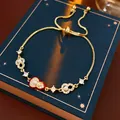 Pulsera ajustable de corazón dorado con esmalte rojo y detalles de circón - Dorado-Rojo (Bañado en Oro 18K)