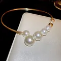 Elegante gargantilla dorada con perlas barrocas y colgante de perla de Mickey Mouse - Estilo de Perlas Abiertas / Dorado