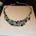 Vintage palace style statement necklace with black and grey rhinestones on a beige box - 10# Necklace / Gold, Black