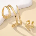 Set di gioielli con bracciale aperto geometrico dorato e anello a spirale da donna - Bracciale E Anelli / Oro