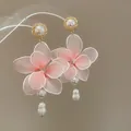 Elegant pink fabric flower drop earrings with dangling white pearls for a sweet vacation look. - Silver Post Style (110#) / Pink