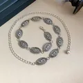 Detailed view of vintage engraved metal waist chain with oval links and lobster clasp. - Oval Style / Silver