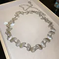 Vintage silver butterfly metal waist chain belt with carved details in Y2K aesthetic style - Butterfly Design / Silver