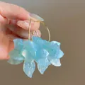 Elegant blue fabric flower petal hoop earrings for a sweet summer beach vacation style - Silver Earring Post Hoop Style (144#) / Blue
