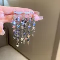 Silver needle long tassel dangle earrings with glittering star pendants and rhinestones - Star Tassel Style / Silver