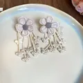 Handmade fabric flower earrings with beaded butterfly tassels for summer beach style. - Silver Post Style (166#) / White