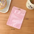Vista detallada de bolsa de cierre hermético rosa macaron con medidas 10,5x15cm y agujero - 10.5x15cm / Rosa