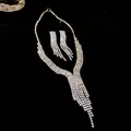 Detail of elegant silver-colored tassel necklace and earrings set with rhinestones - V-Shape Style (HN3816) / Silver