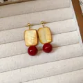Elegant Maillard style vintage earrings with tiger eye stone and deep red round beads. - Tiger Eye Dark Red Ball Studs / Brown-Red