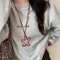 Red resin flower pendant necklace with leopard print cord on grey sweatshirt - Style 11-Coffee-Red