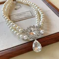 Close-up of French vintage double-layer pearl necklace with sparkling teardrop crystal. - Double Layer Water Drop Style / Silver