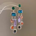 Elegant long tassel earrings featuring multi-colored gemstones and glittering rhinestones. - Multi-Color Geometric Gem Tassel Style