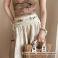 Boheemse gevlochten tailleketting met turquoise en natuursteen op een leren koord - Wit