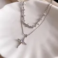 Exquisite silver double layered necklace featuring a four-pointed star pendant on a white shell plate - 40# Necklace - Starburst Pendant / Two-Piece Set / Silver