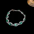Elegant silver tone bracelet with sparkling emerald green zircons and floral accents - 44# Bracelet - Silver - Green
