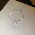 Elegant Wulu charm bracelet featuring mother of pearl and sparkling zircon stones - Adjustable Gourd Style (16#) / Silver