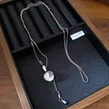 Elegant silver Y-shaped shell pendant necklace displayed in a wooden jewelry tray - 55# Necklace (Silver)