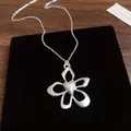 Elegant silver flower heart pendant necklace with matte finish displayed on black velvet - 69# Five-Petal Flower Brushed Necklace (HN8438) / Silver