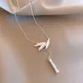 Elegant matte silver-tone bamboo leaf and stalk pendant necklace on silk fabric. - 76# Bamboo Element Brushed Necklace (HN8438) / Silver