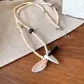 Handcrafted seashell pendant necklace featuring cream beads and black accents for resort style - 75# Nautilus Shell Handmade Woven Necklace (HN8438) / White