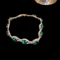 Elegant gold finish bracelet with oval green zircons and clear crystals - 43# Bracelet - Gold - Green