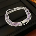 Elegant four-row tennis bracelet with purple and white cubic zirconia stones. - 49# Bracelet - Silver - Purple