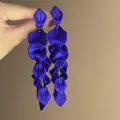 Close-up of elegant long blue petal tassel earrings with a matte texture finish. - Eco Steel Post Petal Tassel Style (18#)