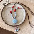 Handmade woven holiday necklace with blue ceramic shell pendant and colorful beads - 101# Necklace - Blue & Multi-color
