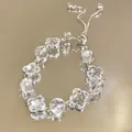 Elegante bracciale regolabile con fiori in zircone e perline di cristallo trasparente - Stile Fibbia a Scorrimento Quadrifoglio (Bracciale 111#) / Argento-Bianco