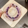 Close-up of double-layered purple and pink natural stone beaded bracelets on wooden tray - Style 12 (Double Layer) / Purple-Pink