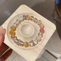 Elegant multi-color crystal beaded bracelet with hollow flower spacers on a wooden tray - Style 16 (Vintage Maillard) / White-Coffee