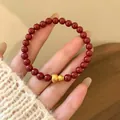 Vintage red beaded bracelet featuring a hollow gold gourd charm in chic Maillard style. - Style 17 (Hollow Gourd) / Red-Gold